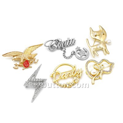Pin tal-lapel tal-libsa tan-nisa tad-deheb